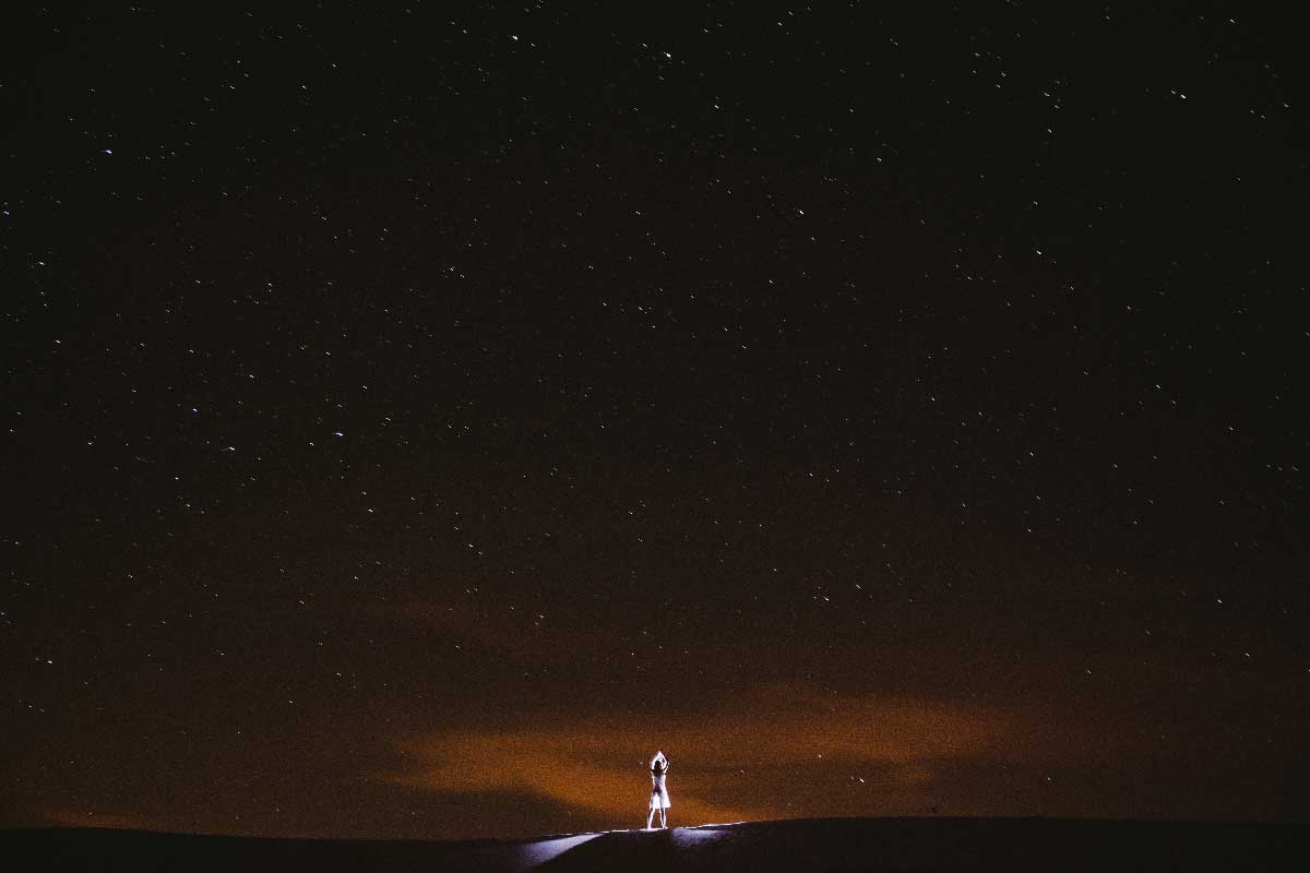 "In order to achieve this image I held a flashlight over my head and we opened the shutter for 30 seconds. That place feels so alien that a lot of the photographs I've taken there aim to show the human form in a cosmic-otherworldly way." Celestial Bodies, White Sands.